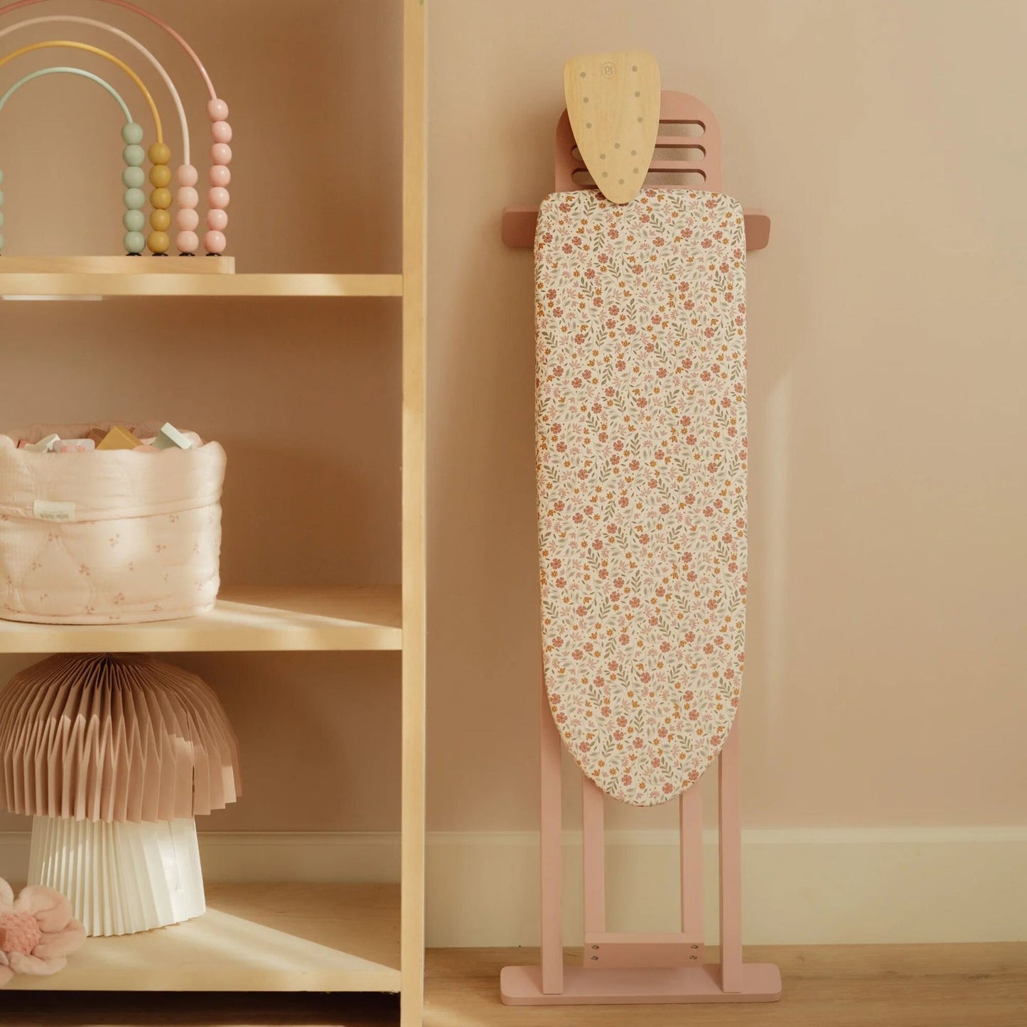 Wooden ironing board with iron