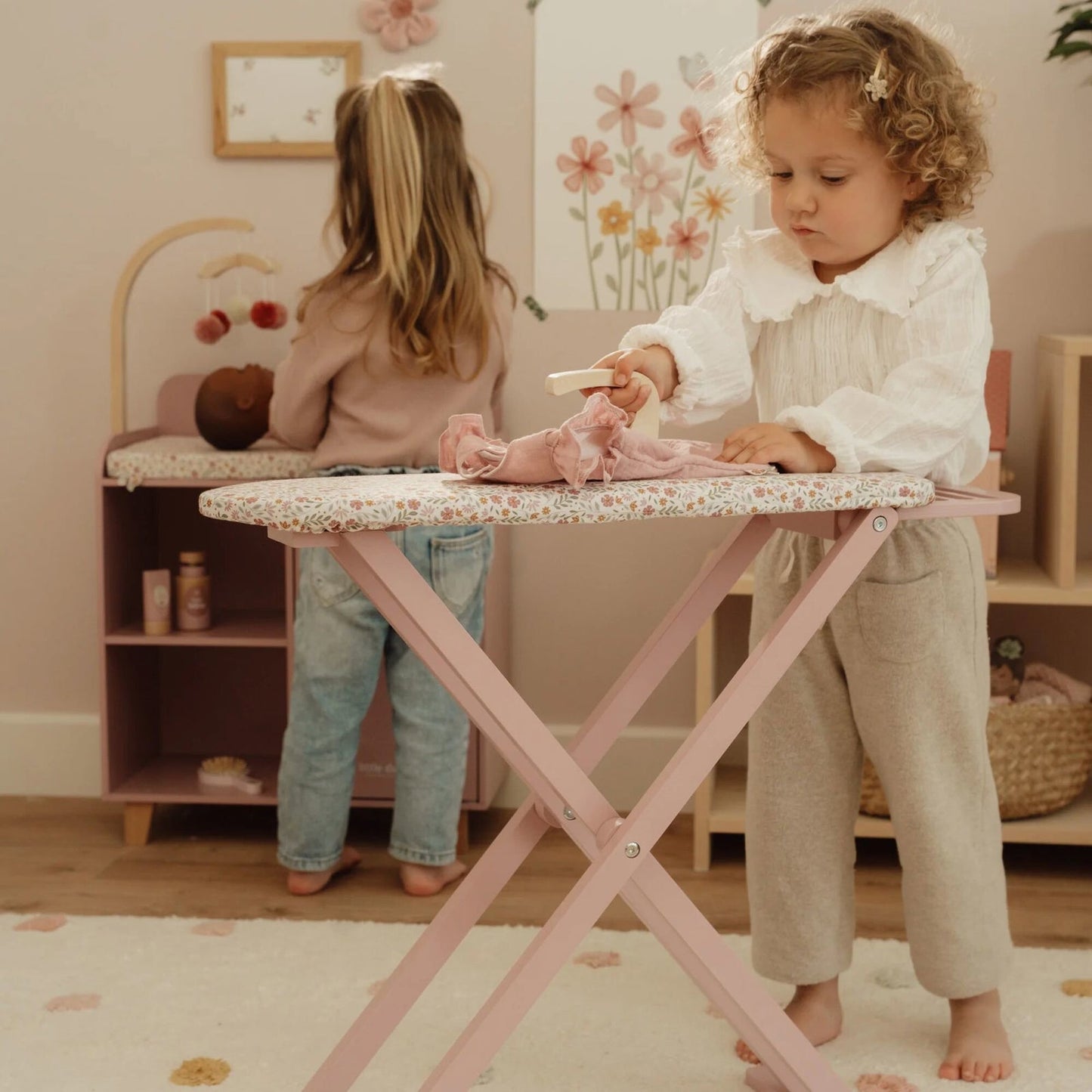 Wooden ironing board with iron
